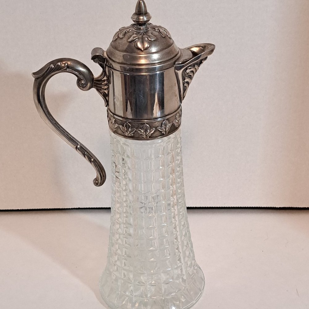 Vintage cut glass and silver plated mental ewer.